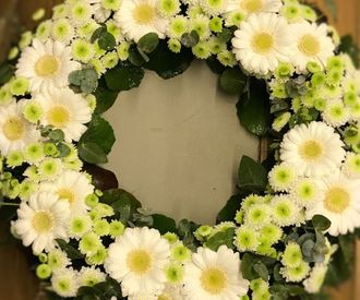rings blommor begravning 5